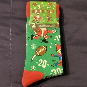 Green Christmas Socks with Santa and Football Design